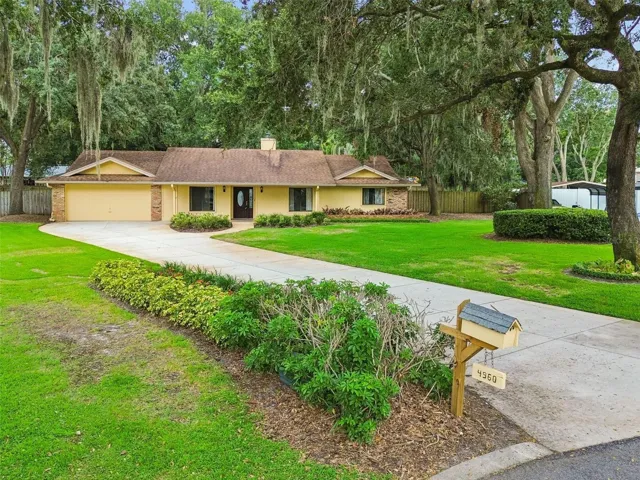 Meticulously maintained 4 bedroom, 2 bath home on .58 acres