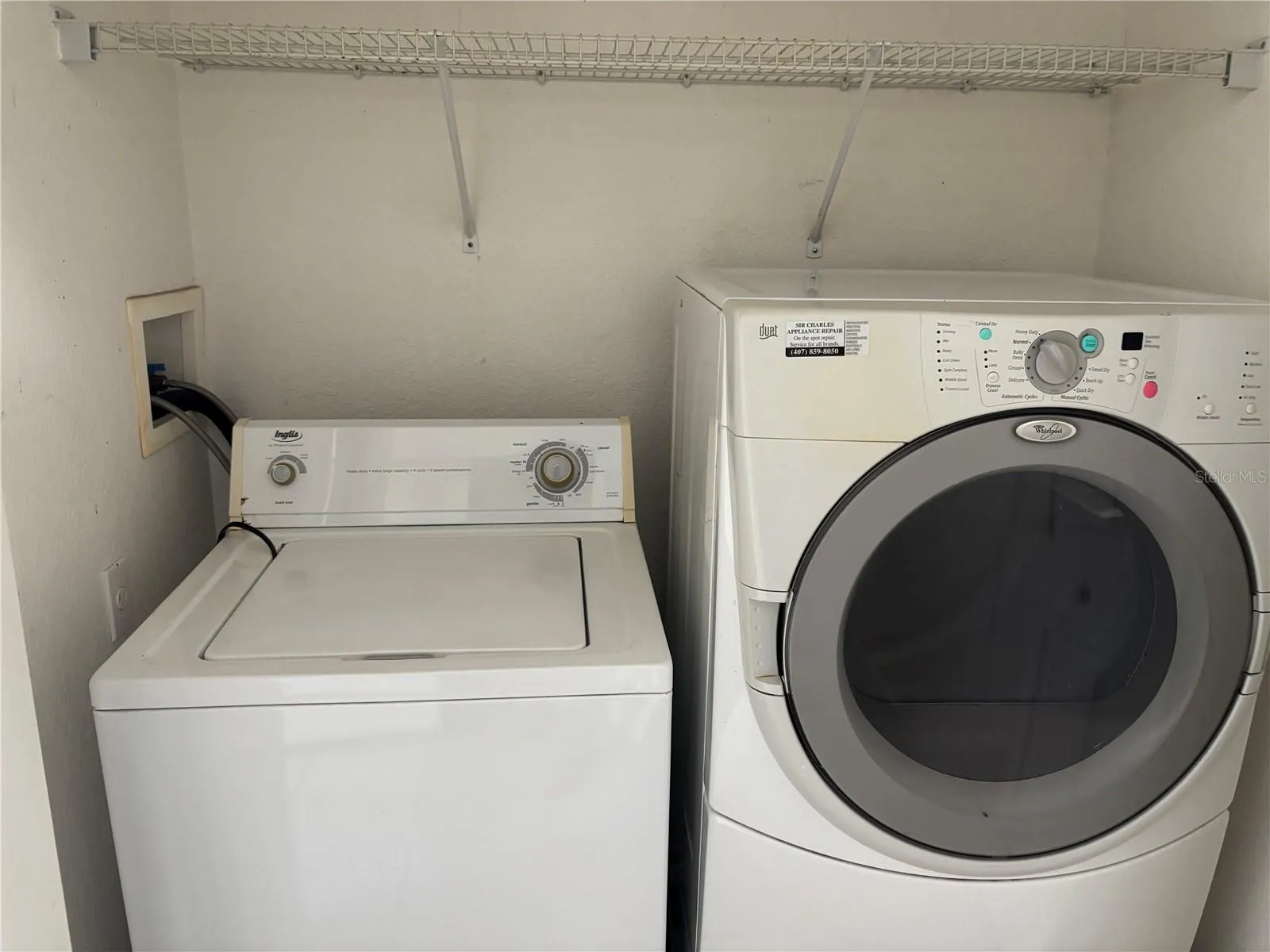 Laundry closet located between suites.