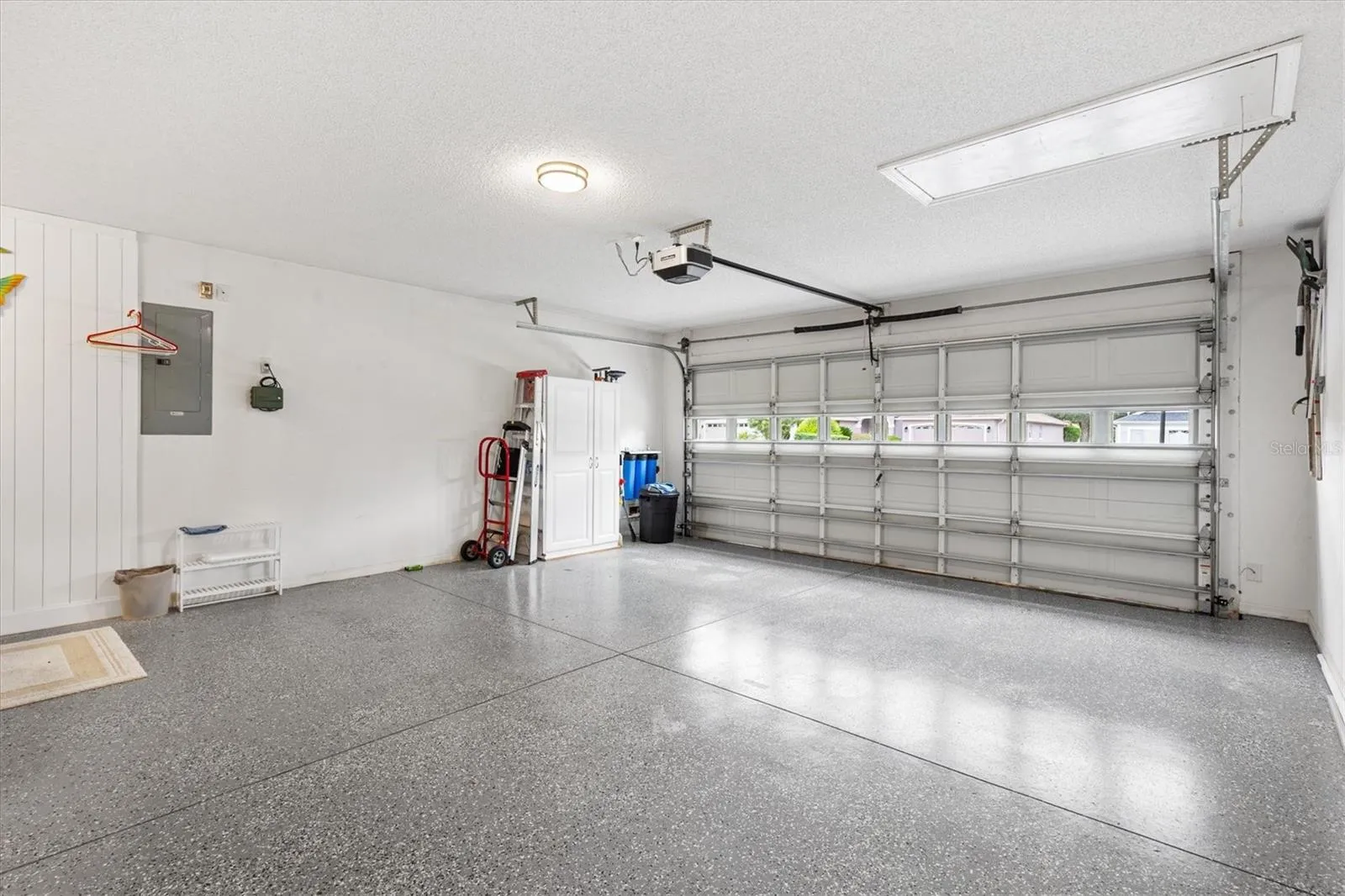 NEW EPOXY GARAGE FLOOR*NEW NOVA WATER FILTRATION SYSTEM*NEW GARAGE DOOR OPENER