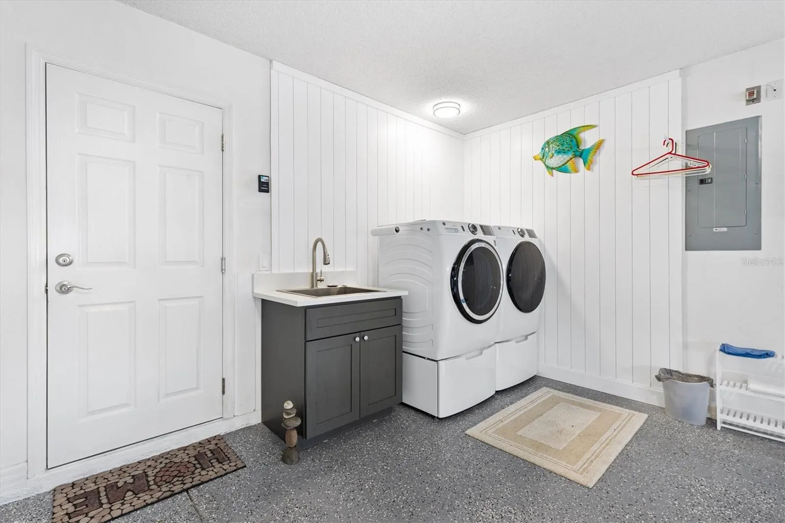 NEW LAUNDRY AREA*NEW WASHER/DRYER*PANELED WALL*NEW SINK W/CABINET