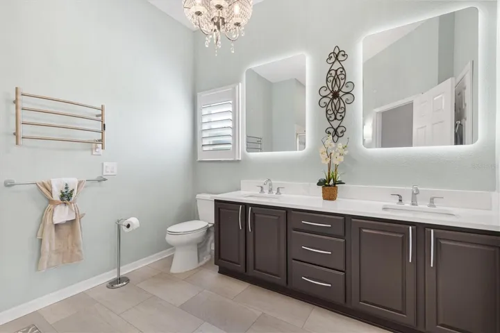 TOWEL WARMER*LED MIRRORS*QUARTZ COUNTERTOPS W/NEW SINKS AND FAUCETS*NEW PLUMBING*NEW LIGHTS
