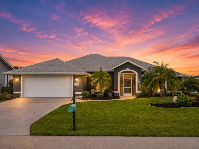 FrontExterior_7200NBlueSage_PuntaGorda_CurbAppeal_Twilight.jpg