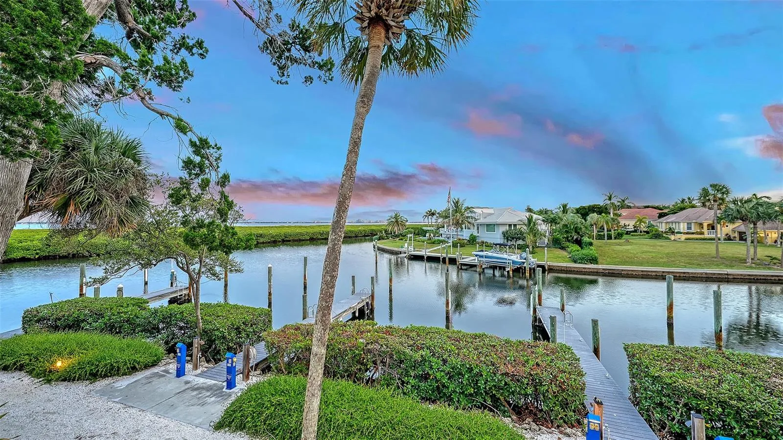 YOU ARE JUST STEPS AWAY FROM YOUR PRIVATE DOCK W/ POWER & WATER