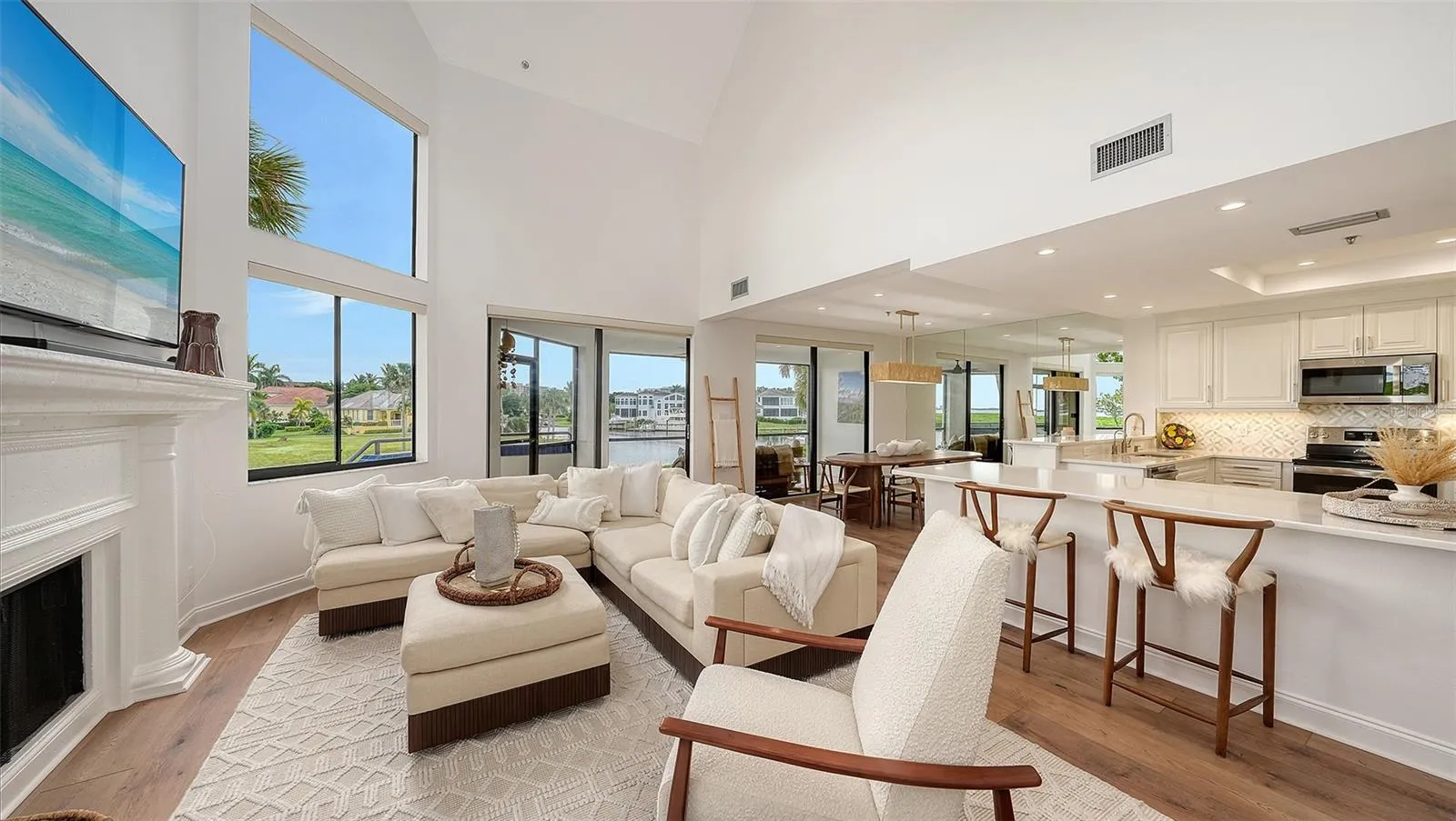 ENJOY THE SOFLTY FURNISHED GREAT ROOM ENJOYING A MOVIE