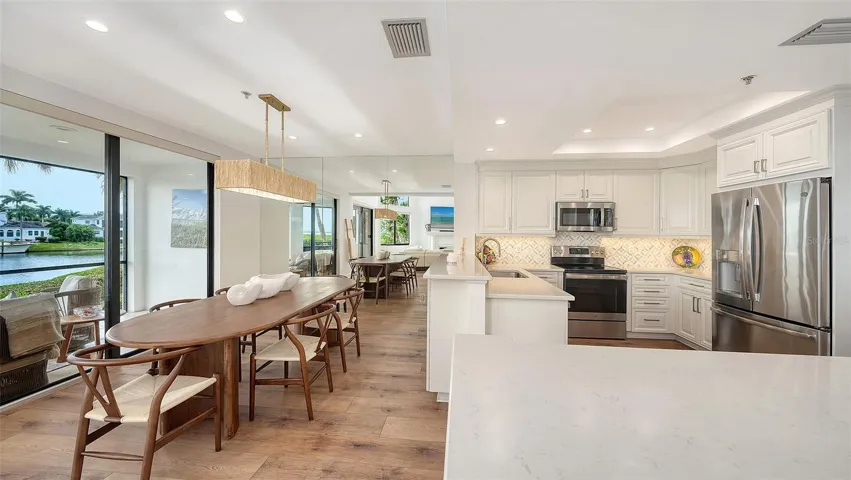 THE SERVING ISLAND HAS GREAT CABINETRY STORAGE