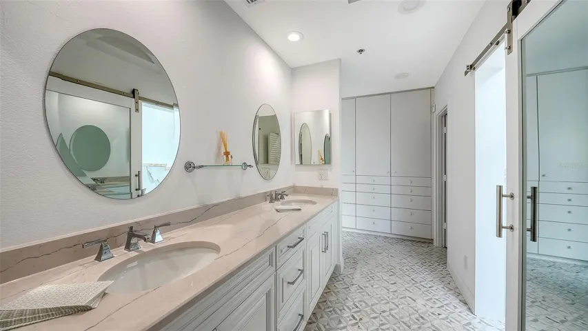 DUAL VANITIES & A SEPARATE LINEN CLOSET