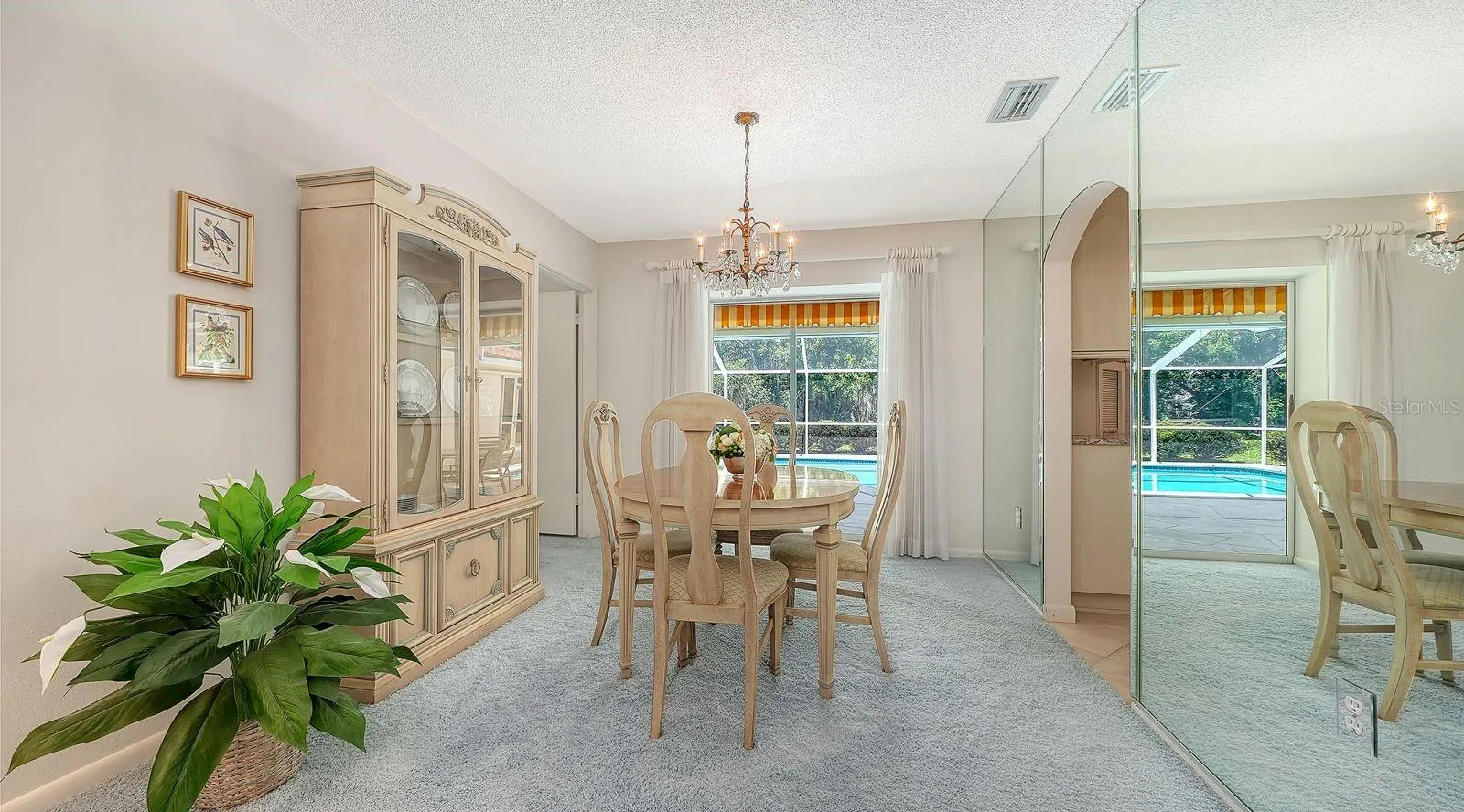 Dining Room that overlooks the Pool Area
