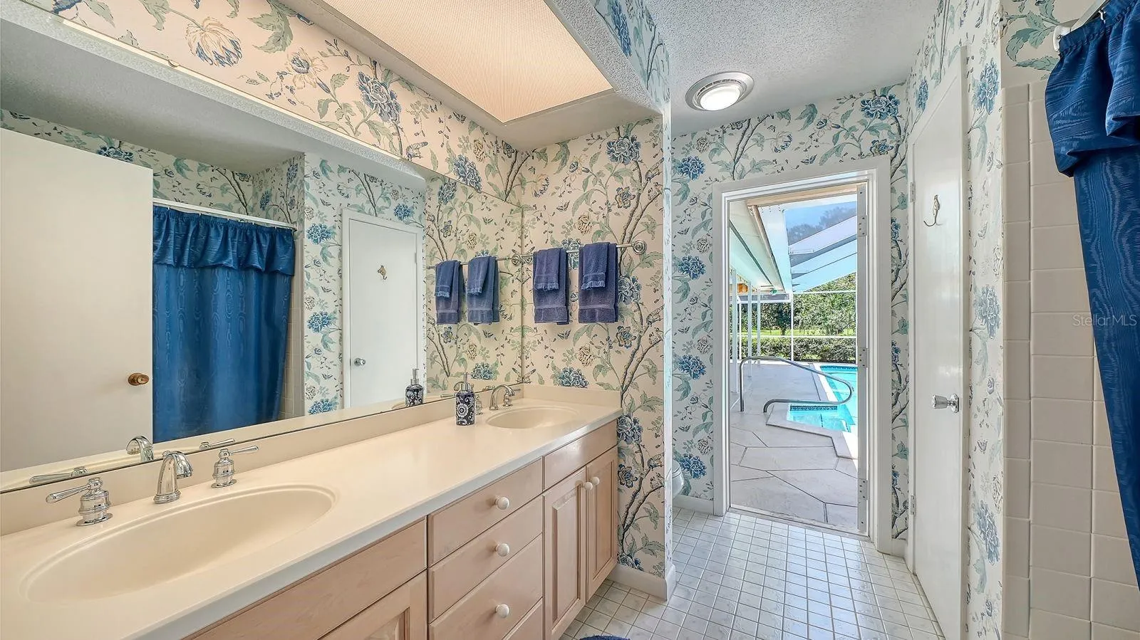 3rd Bathroom with an access door to the Pool Area