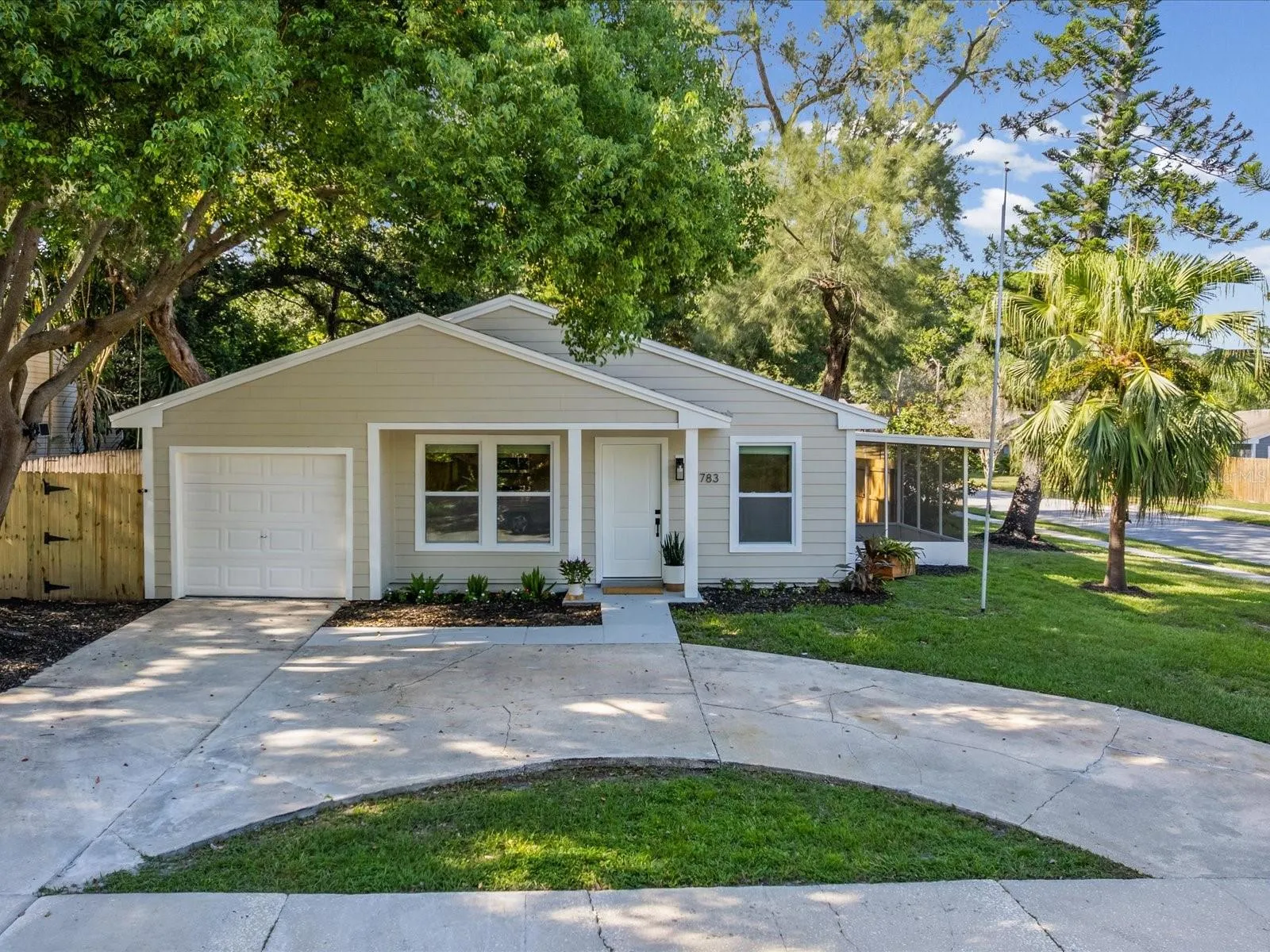 Beautiful Freshly Painted Home with U Shaped Pull Through Driveway