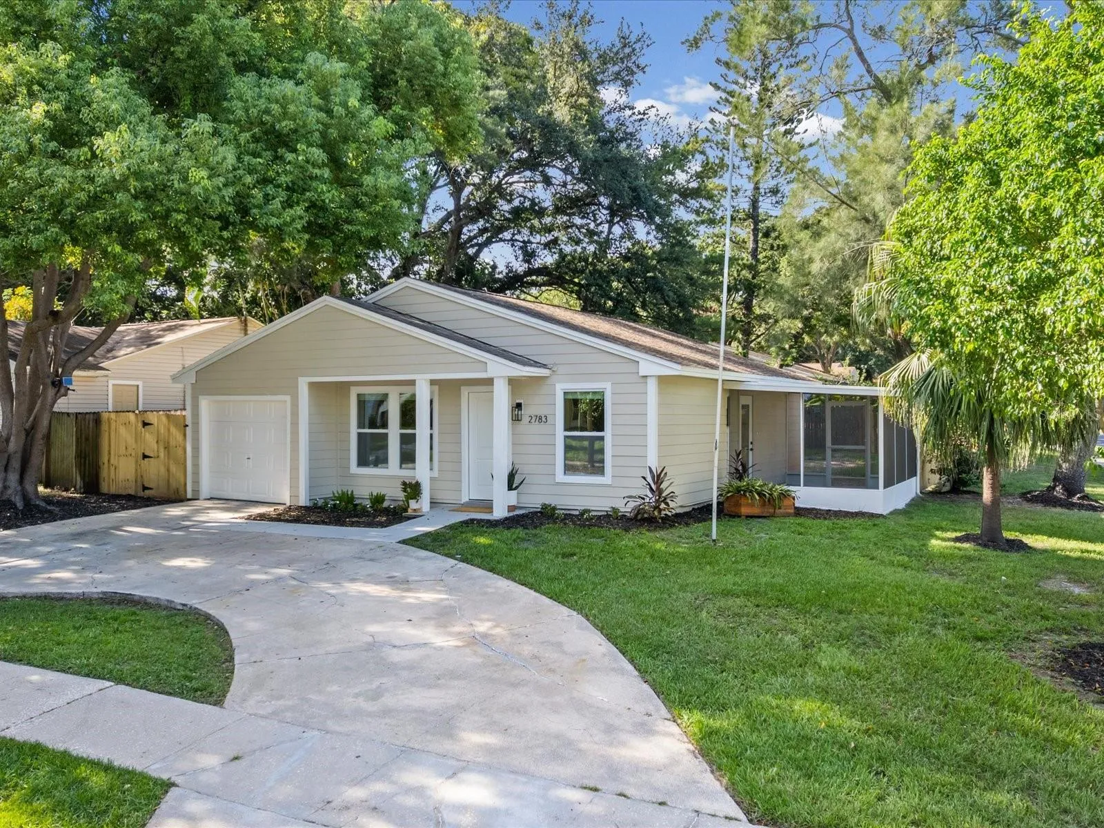 Mature Trees Provide Mid Day and Afternoon Shade on the House and Driveway