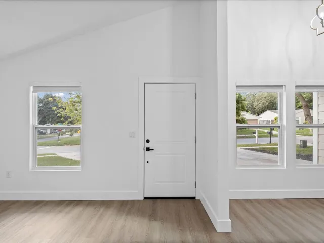 Light and Bright Front vWindows with Custom Linen Look Shades