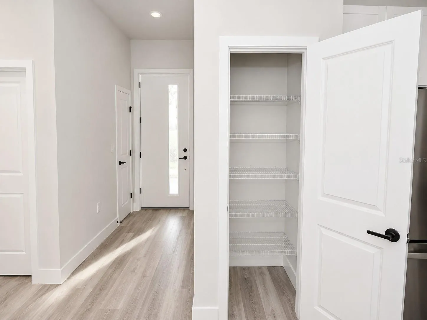 Hallway with additional closet storage