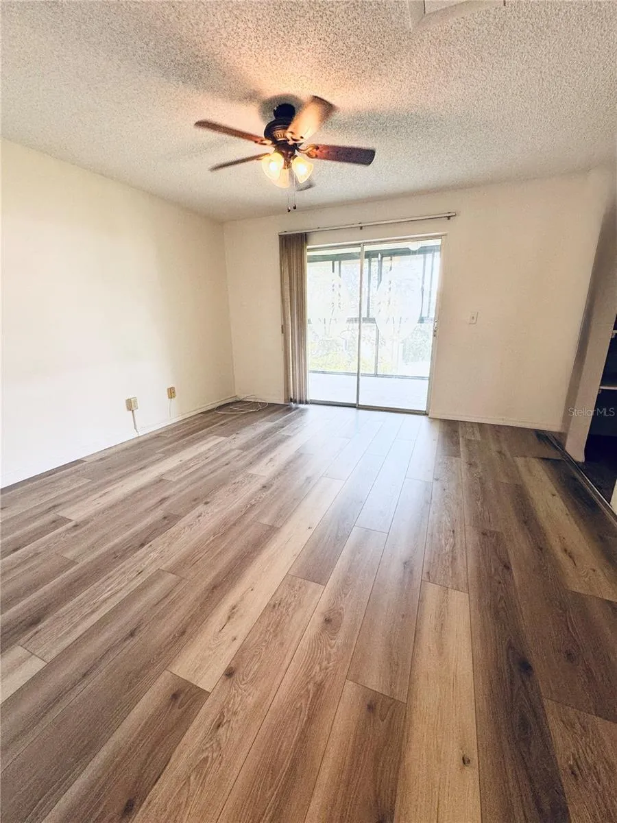 Bedroom leads out to enclosedLlanai/Florida room.
