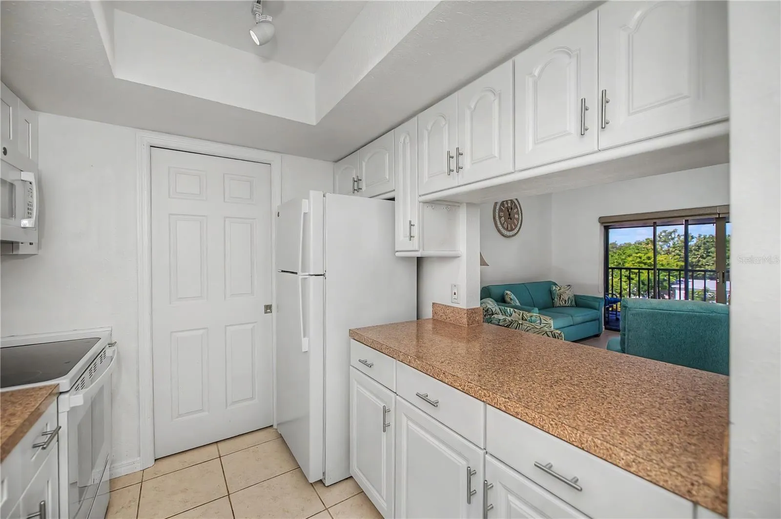 Nicely appointed galley-style kitchen opens to the great room. Laundry room off of the kitchen.