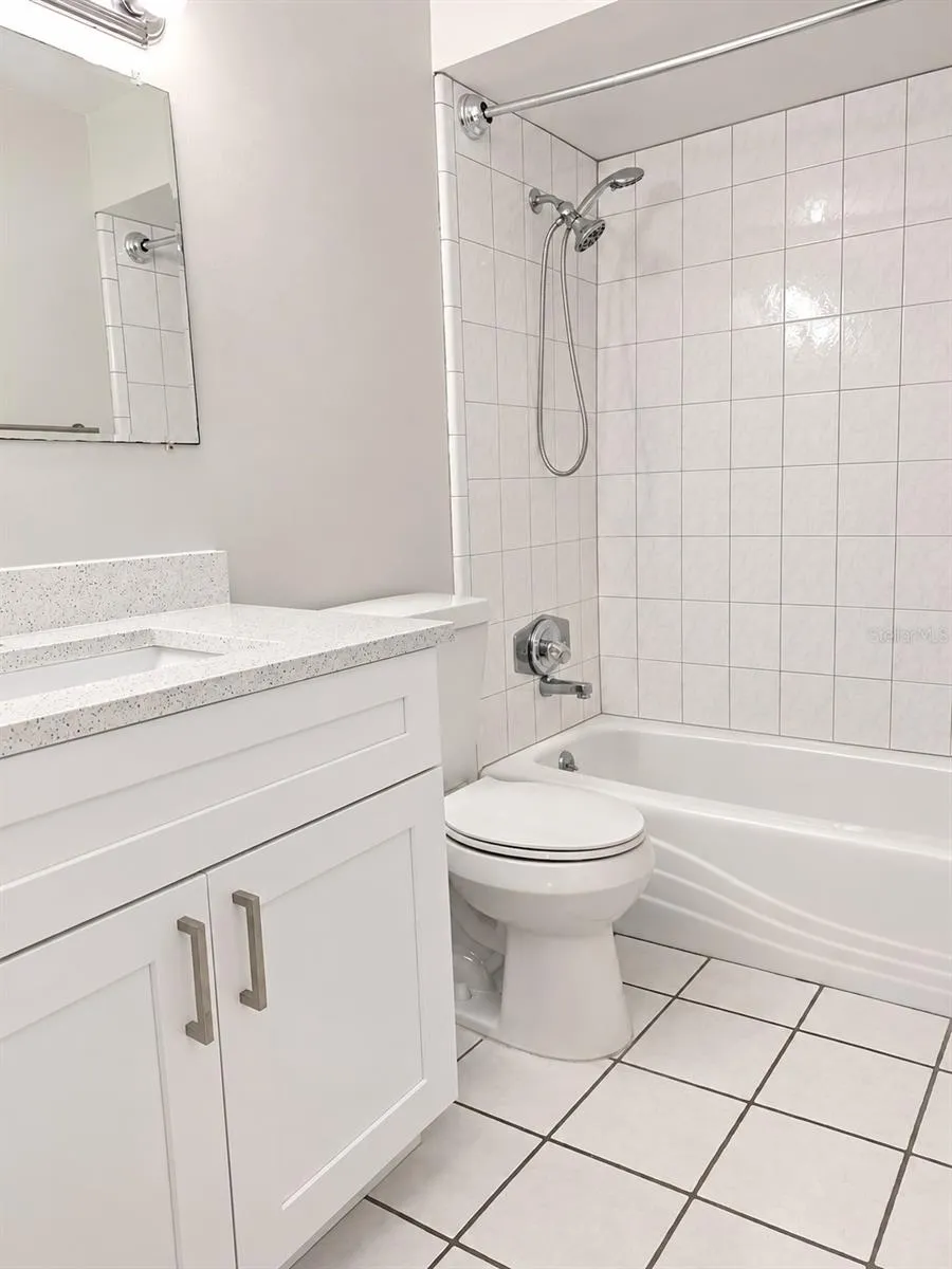 Second bathroom includes tub.