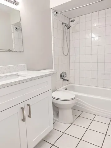 Second bathroom includes tub.