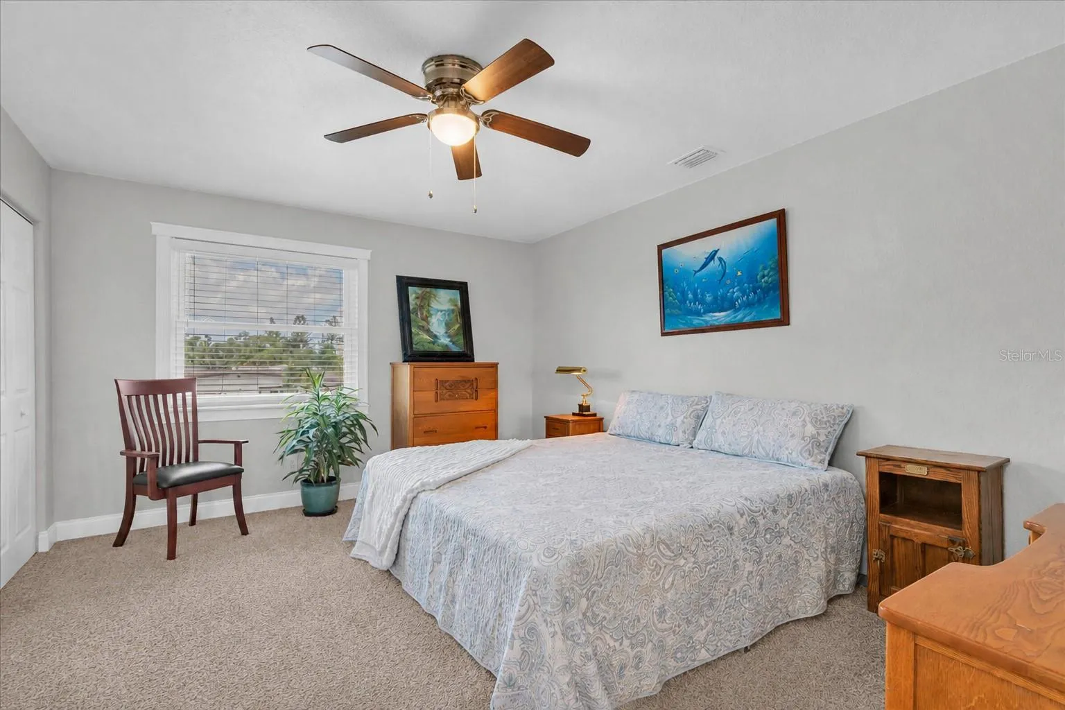 Generously sized second bedroom offering plenty of room for a complete bedroom suite &amp; additional furnishings.