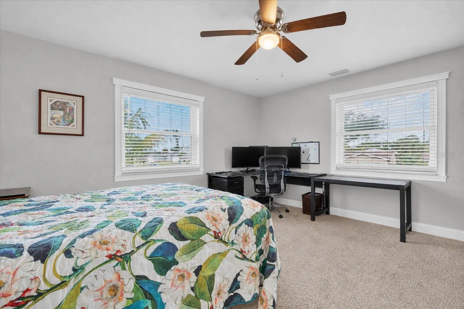 Spacious &amp; inviting third bedroom with generous proportions, providing wonderful flexibility for family, guests or a home office.