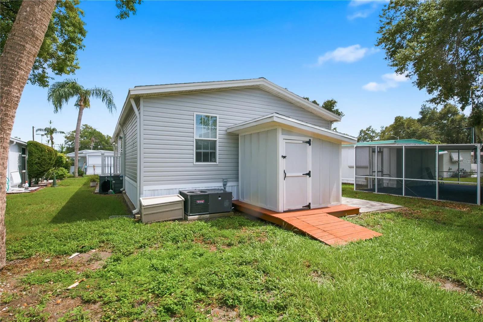 Backyard with storage shed and paver area