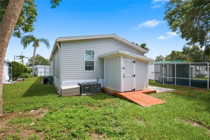 Backyard with storage shed and paver area