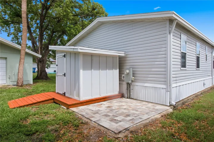 Backyard with storage shed and paver area