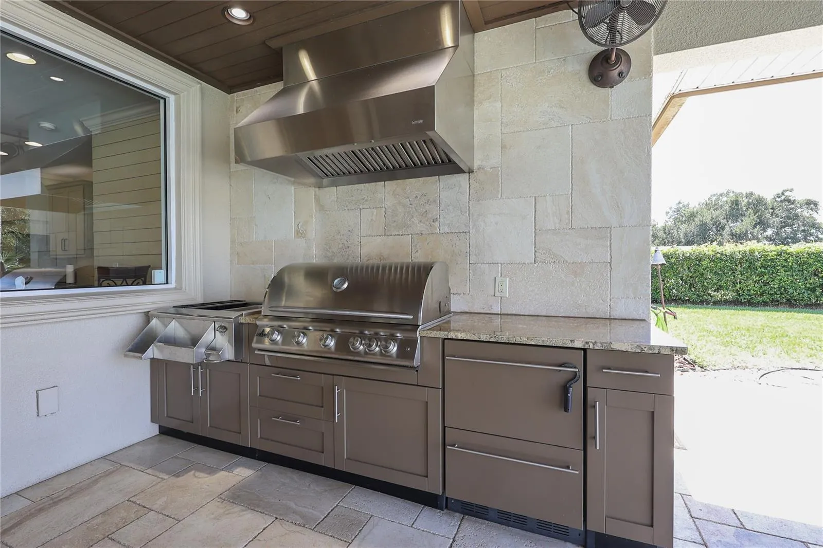 Outdoor kitchen with new grill