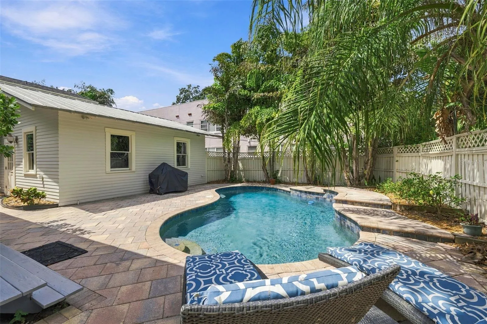 Garage with Alley access &amp; Pool with waterfall!
