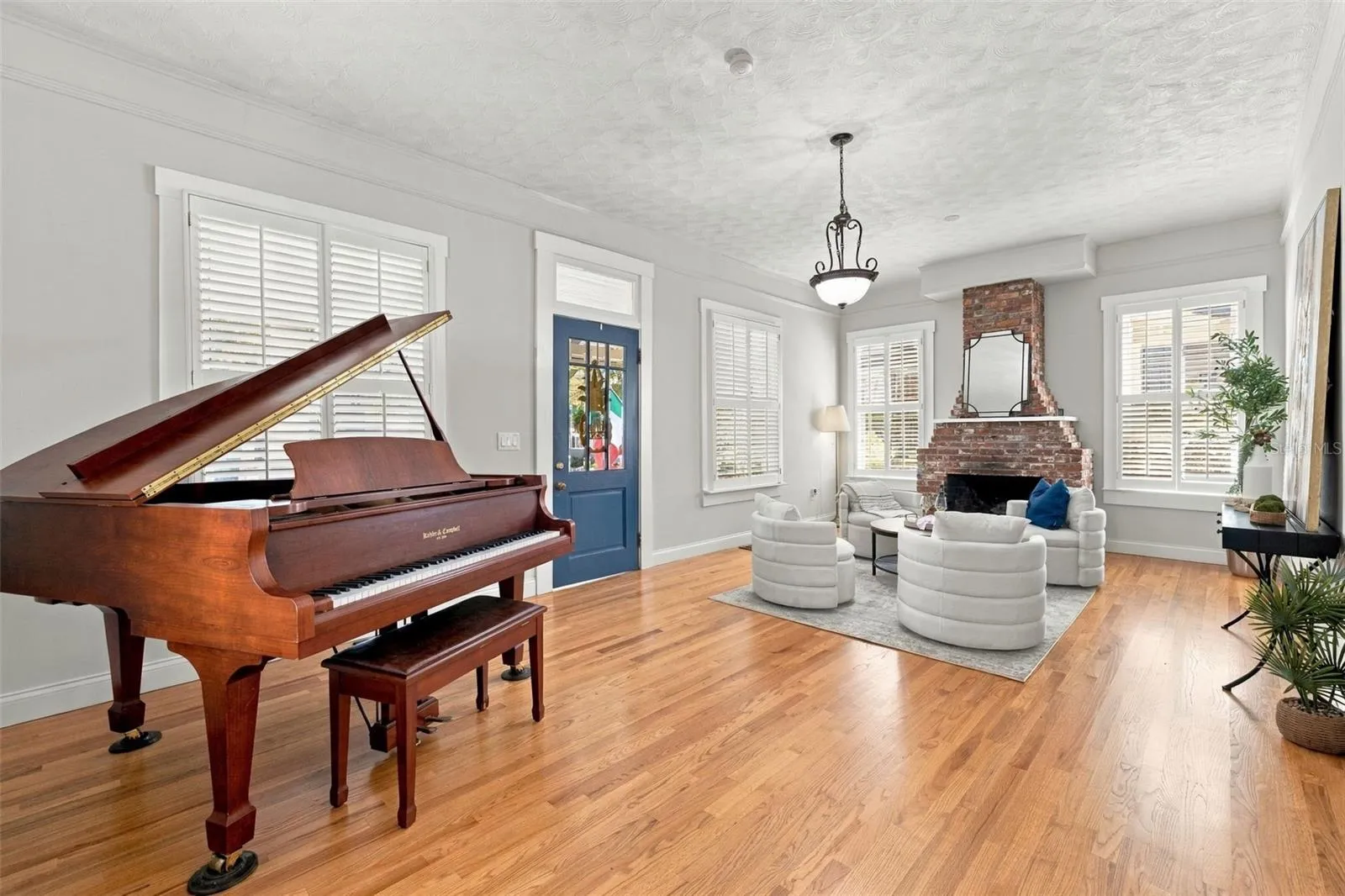 Spacious Entrance with woodburning fireplace