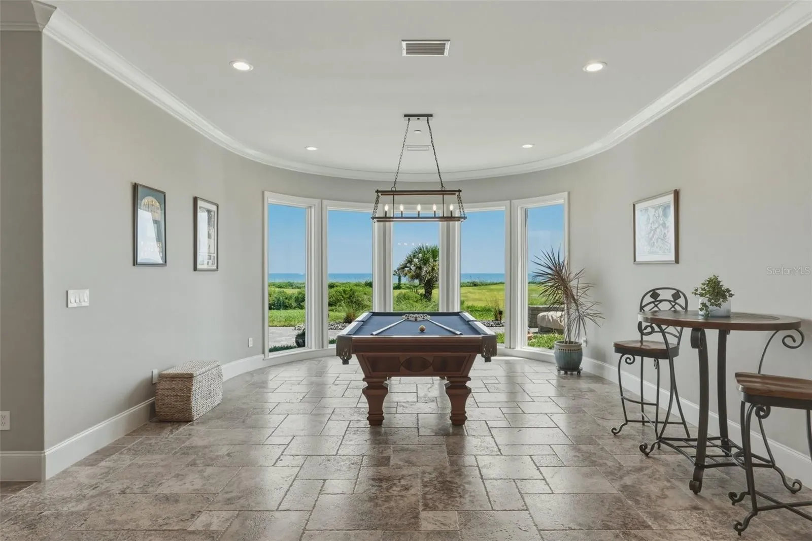 FIRST FLOOR - BAR AND SOCIAL ROOM WITH AMAZING VIEWS OF THE GOLF COURSE AND OCEAN