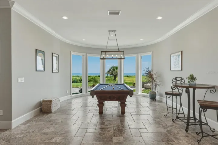 FIRST FLOOR - BAR AND SOCIAL ROOM WITH AMAZING VIEWS OF THE GOLF COURSE AND OCEAN