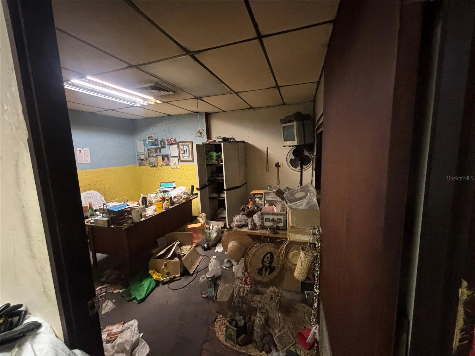 Another former office area - imagine this with the partitions removed and ceiling returned to its original height.