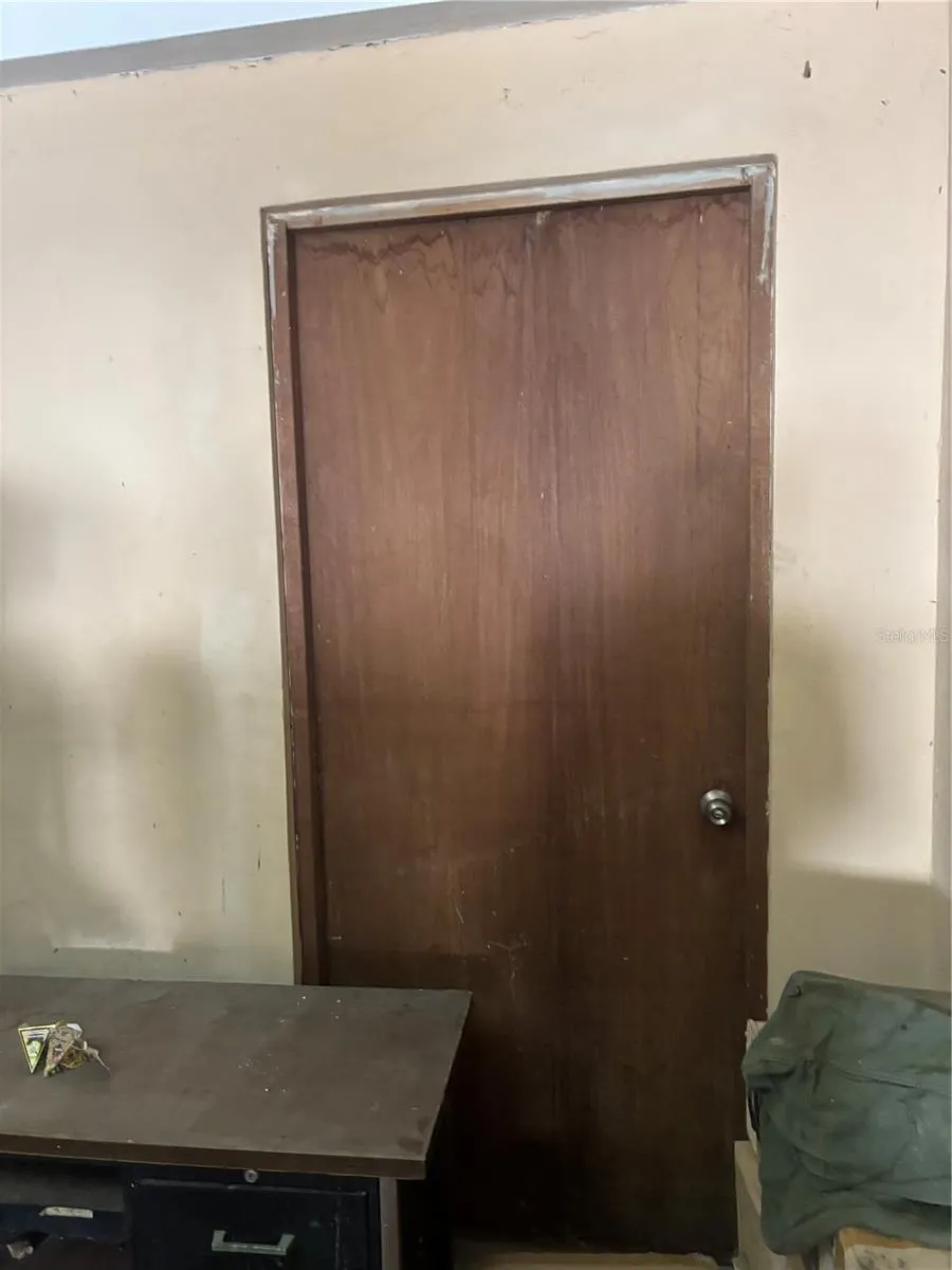 Door from garage to lobby staircase.
