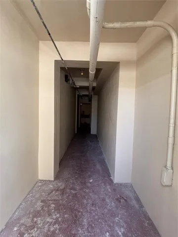 There is an entrance from the parking area to the building lobby. There is also direct access from the garage, warehouse and retail levels to the lobby staircase.