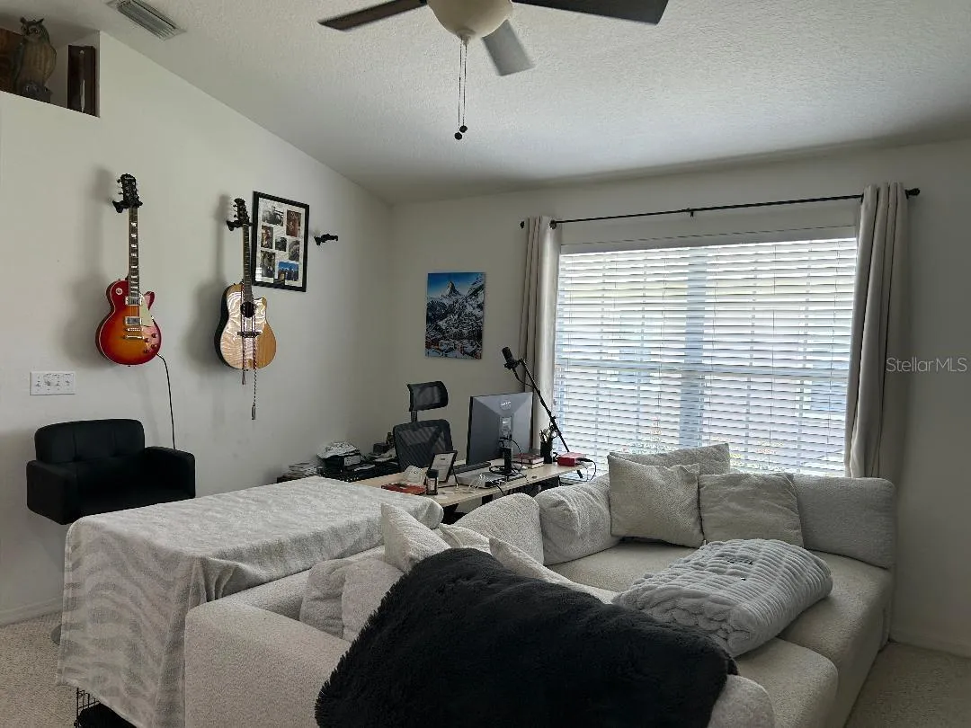 Upstairs bonus area; large enough for sitting area &amp; desk