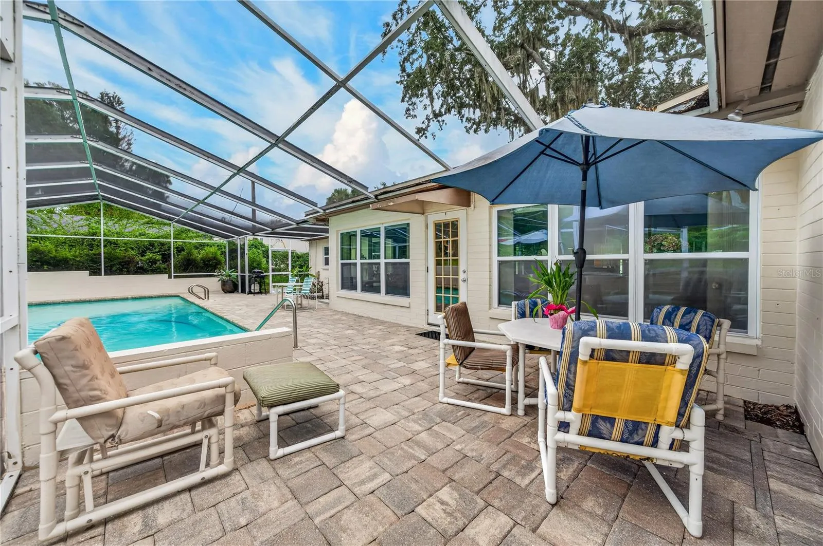 Pool deck with pavers.