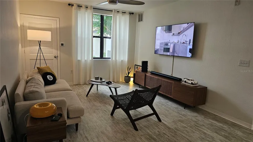 Living room with beautiful window and plenty of light