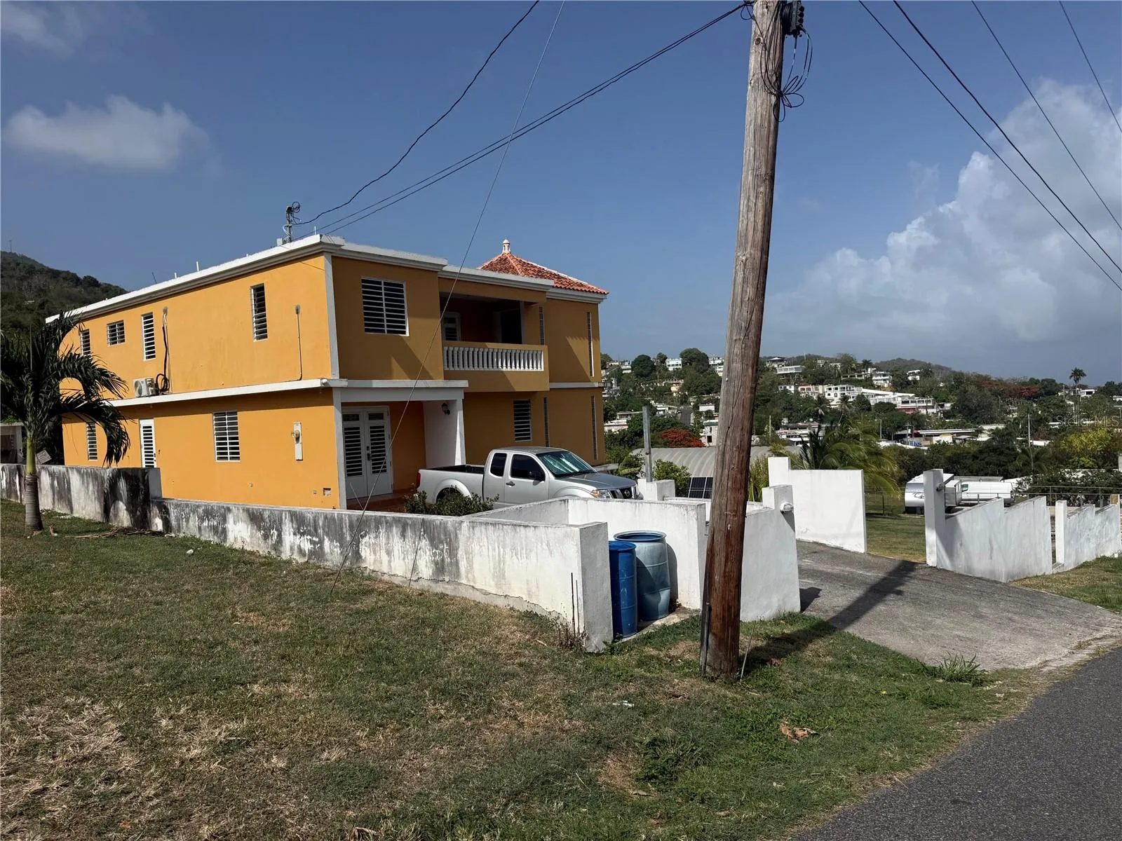 Fachada frontal - Comunidad Mariani, Bo. Emajaguas / Front facade - Mariani Community, Emajaguas Ward