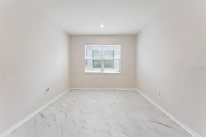 Upstairs Loft – Alternate view showcases the loft’s generous proportions and natural light, offering plenty of flexibility for a second living area, media space, or home workspace.