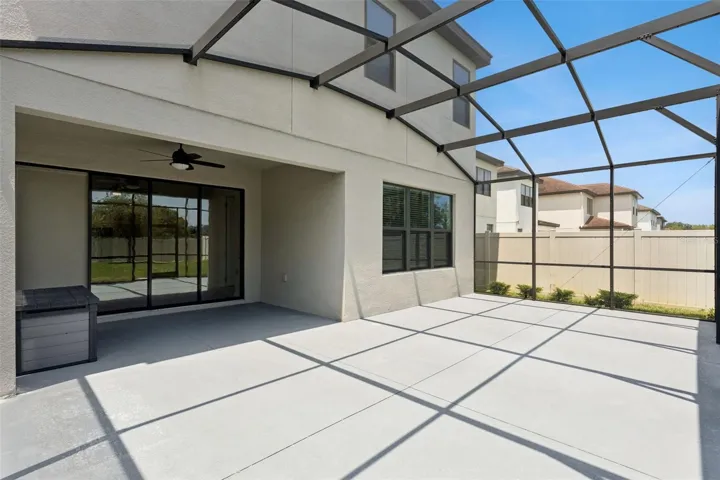 Screened Outdoor Living – Spacious screened patio offers a generous covered area with direct access to the interior and plenty of room for outdoor seating and dining.