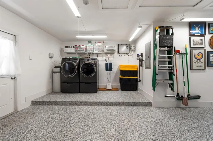 Plenty of space around the laundry with new washer/dryer and on demand water heater means you never run out of hot water!