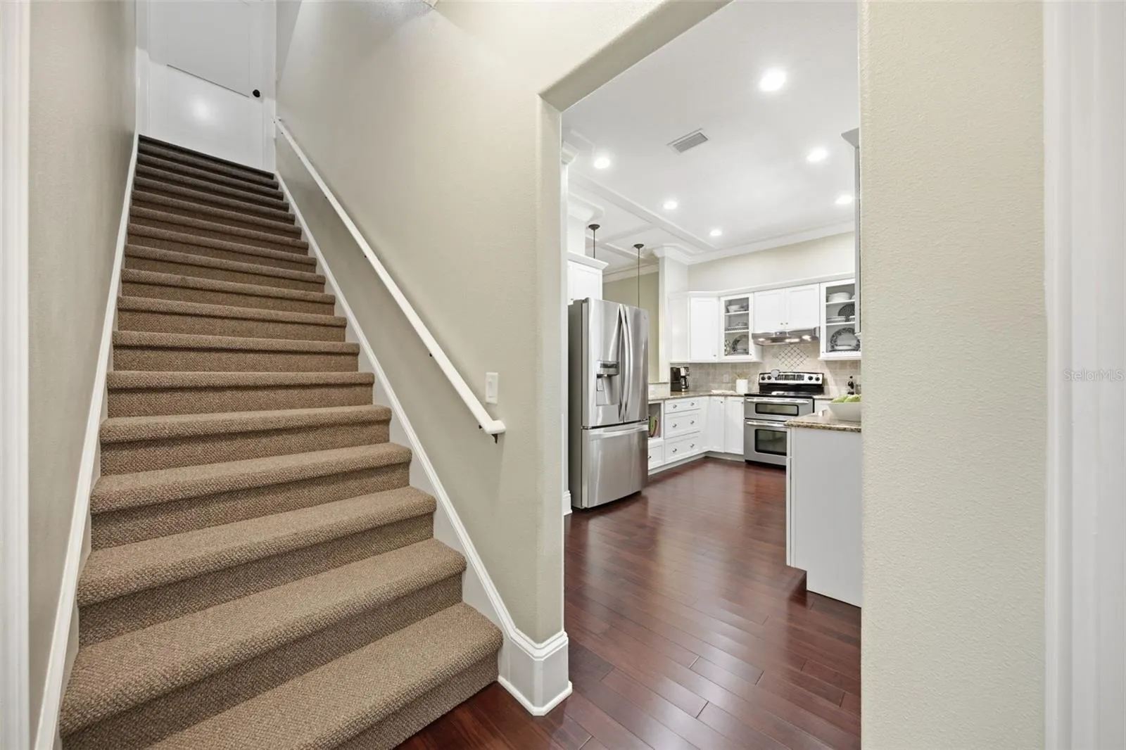 Garage entry way, stair to second level, entry to kitchen and laundry.