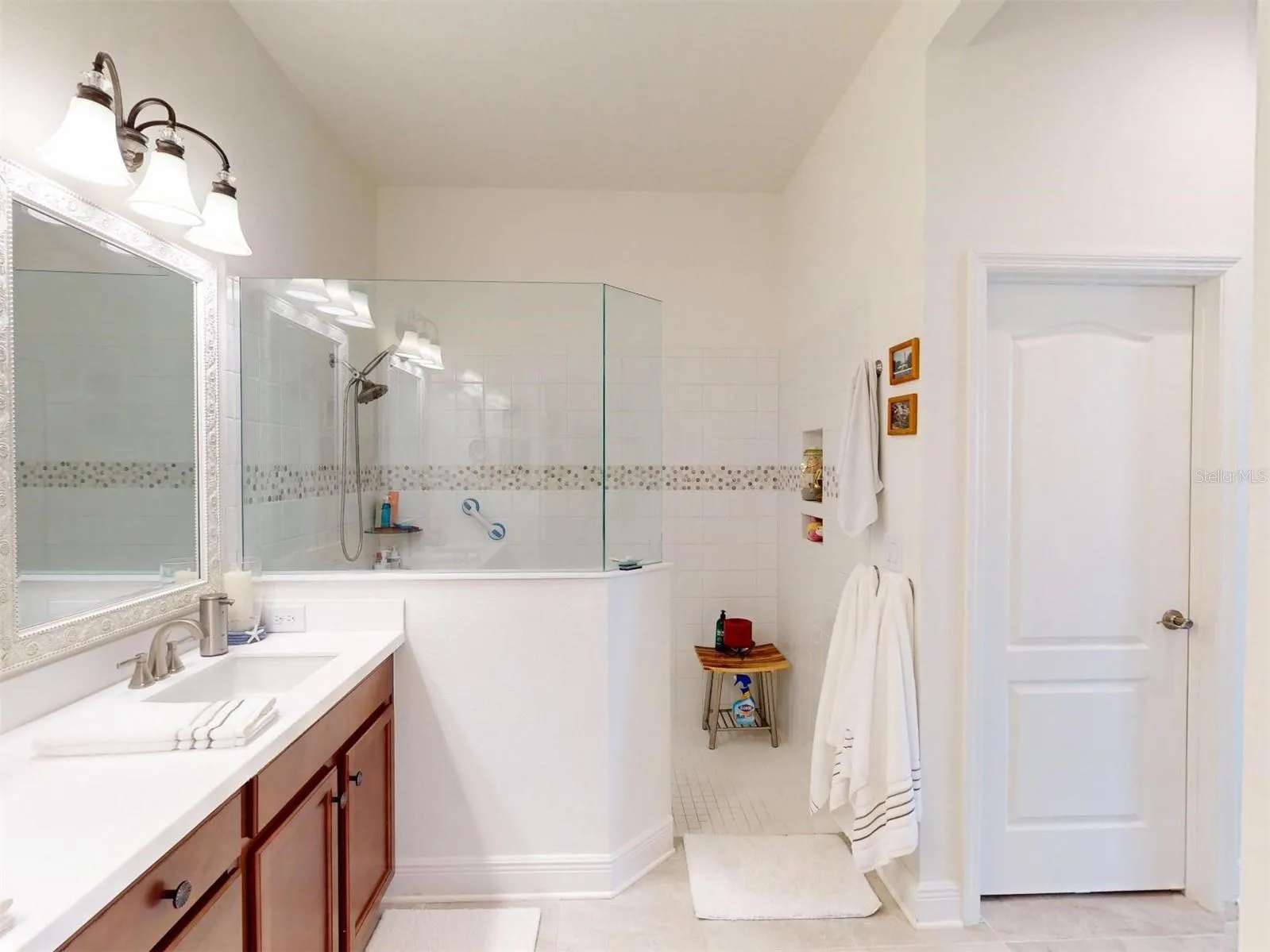 large primary bath - two closets his and hers