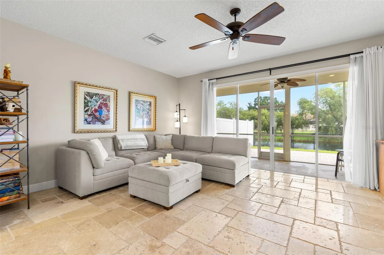 Living room with sliders to screened in lanai