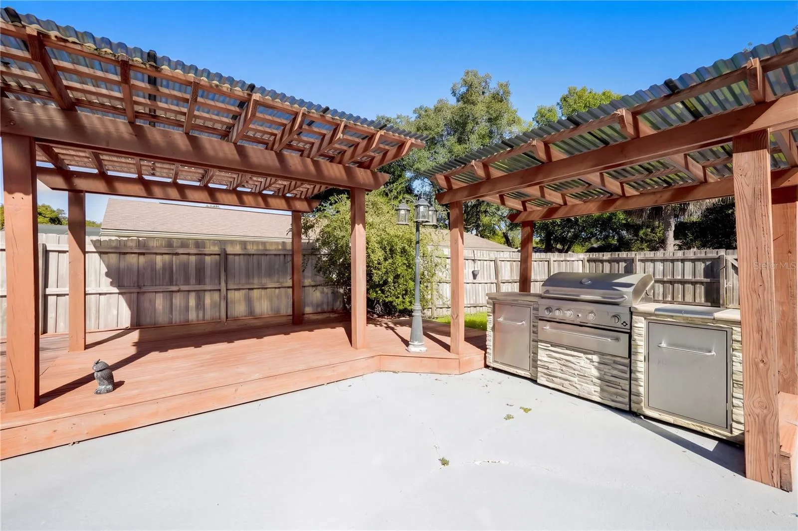 Outdoor pergola and grilling area