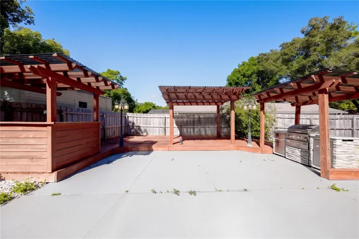 Outdoor pergola and grilling area