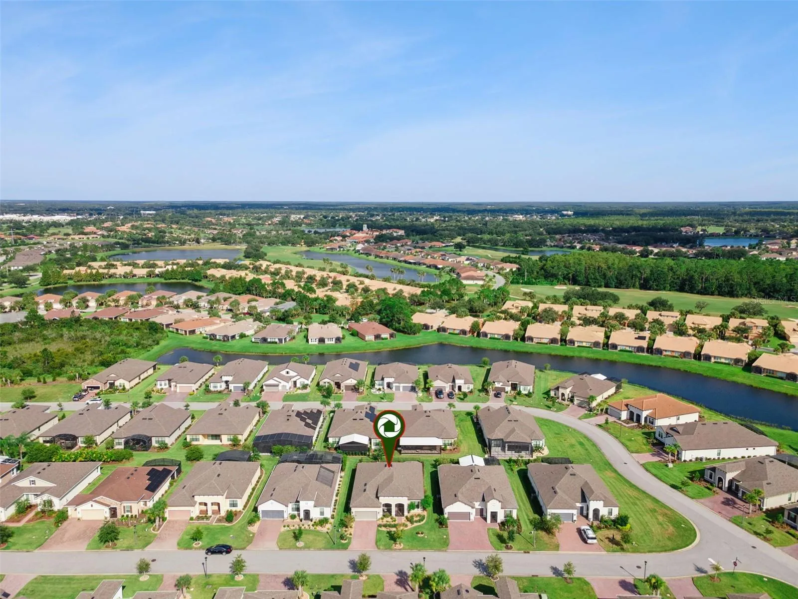 Aerial of Solivita near Poinciana Parkway, with easy access to ChampionsGate, Posner Park, and Lake Nona Medical City.
