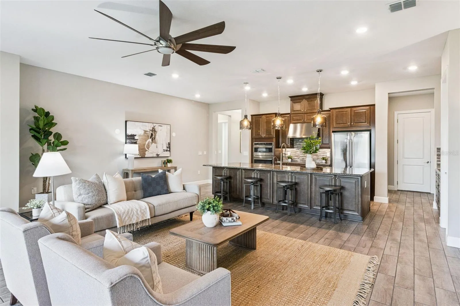 Bright living room open to the kitchen, ideal for everyday living and effortless entertaining.
