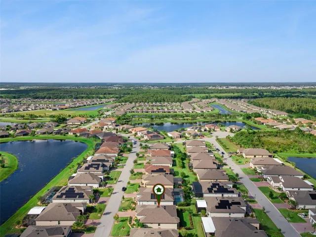 Aerial view of Solivita, one of the Orlando area's premier 55+ active adult communities, with scenic ponds and green space.