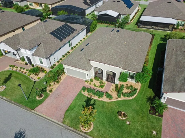Aerial view of 4108 Via Toledo Ct in Solivita, a 55+ active adult community in Poinciana, FL.