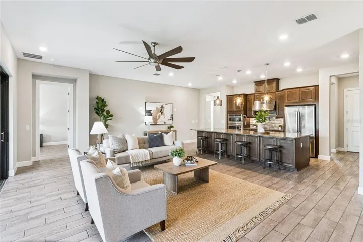 Expansive great room view toward the kitchen and dining areas.